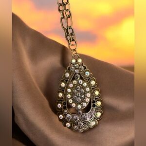 Elegant Gold and Silver Teardrop Pendant Necklace